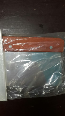 แบ่งแป้งด้ามไม้