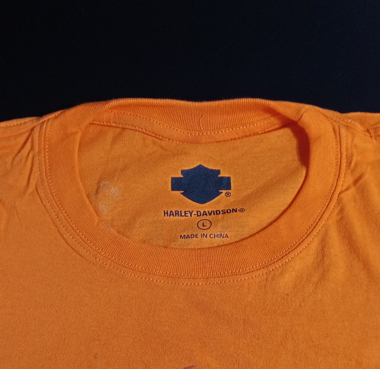 เสื้อยืดคอกลม HD วินเทจ กระโหลกไฟส้ม S,L