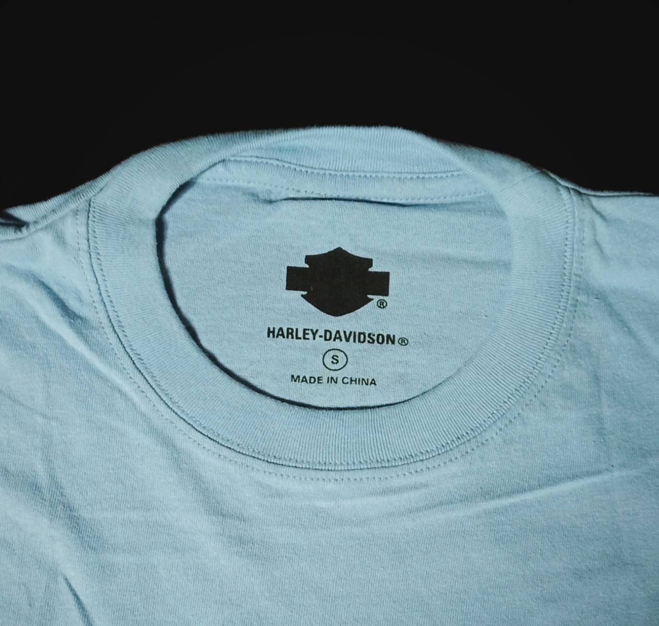 เสื้อยืดคอกลม HD วินเทจ กระโหลกไฟ ฟ้าอ่อน S